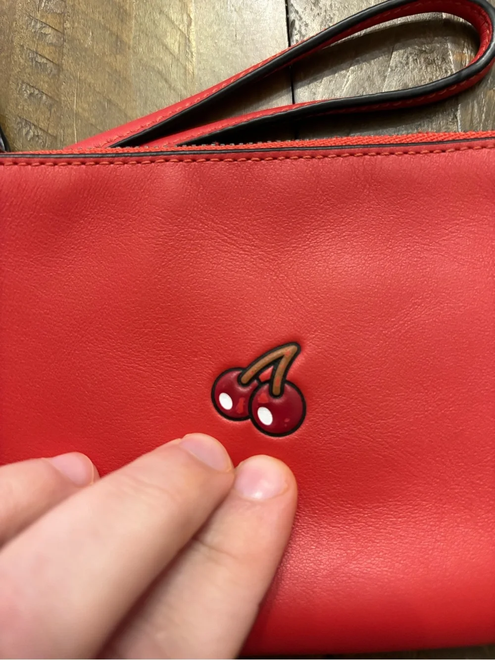 Coach x Pac-Man Corner Zip Wristlet with  Cherry Design